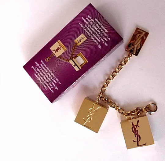 YSL - PARFUM ELLE : 2 CONCRETES : UNE AVEC PARFUM SOLIDE ET L'AUTRE AVEC GLOSS A LEVRES