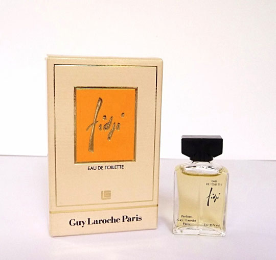 FIDJI - MINIATURE EAU DE TOILETTE 5 ML. DIFFERENTES BOÎTES FURENT CREEES POUR CETTE FRAGRANCE.