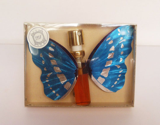 LIF - FLACON TUBE VAPORISATEUR SUR PAPILLON BLEU VIF
