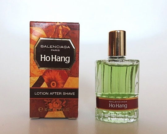 HO HANG - LOTION AFTER SHAVE 10 ML - MINIATURE AVEC BOUCHON DORE, AVEC ETIQUETTE CEINTURE