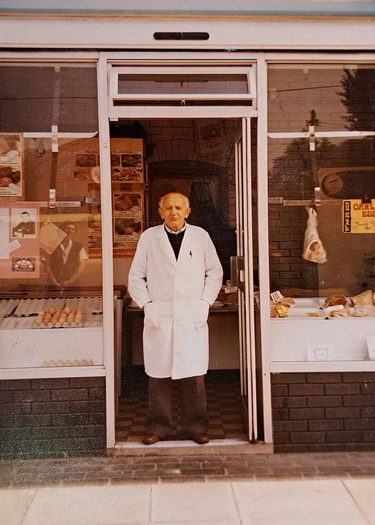 G.J. Pinfold outside number 1012, his butcher's shop in 1984. Ernest Pinfold began the business  here in 1910 (Hay Mills Project)