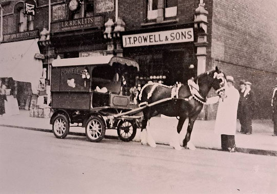 Numbers 1030-34, c. 1935 (Hay Mills Project) Powells' bakery van is outside. Ricketts was a plumber.