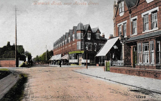 Only one of these buildings is a shop in this postcard of c. 1905