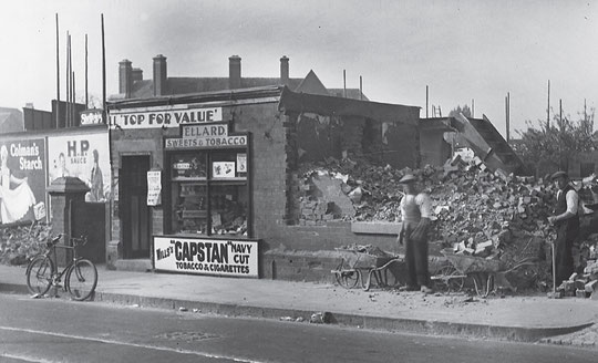 Ellard's confectioners (The Tuck Shop) being demolished, c. 1935 (Birmingham Libraries)