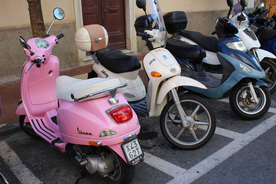 Pink and white Vespas