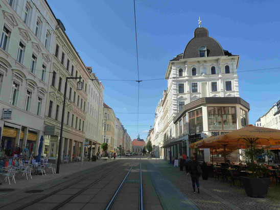 Gründerzeitstadtteil mit Blick auf den Bahnhof im Hintergrund