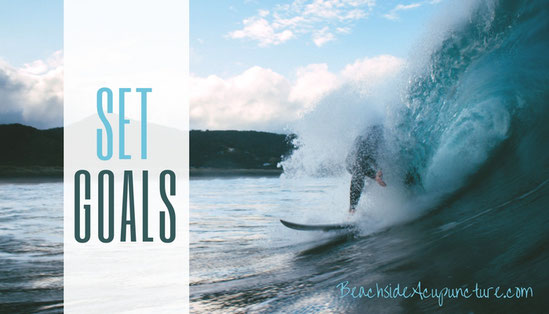 set goals over ocean wave