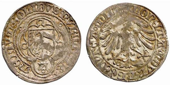 Stadt Nürnberg unter Kaiser Friedrich III., Halbschilling (ab 1465). Silber. Durchmesser ca. 21 mm. Gewicht 1,25 g. Stadtwappen im verzierten Vierpass/Adler. (Foto: Auktionshaus Lanz Auktion 124, 2005, Nr. 1742)