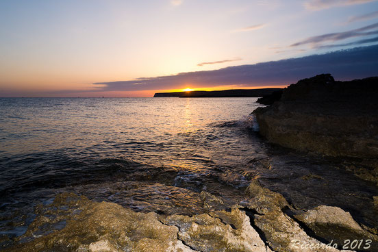 Isola di Lampedusa, tramonto visto da Cala Madonna