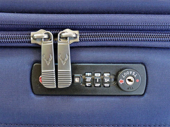 An integrated TSA combination lock on a trolley bag