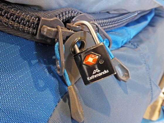 A TSA lock on my bag showing the TSA (red) logo