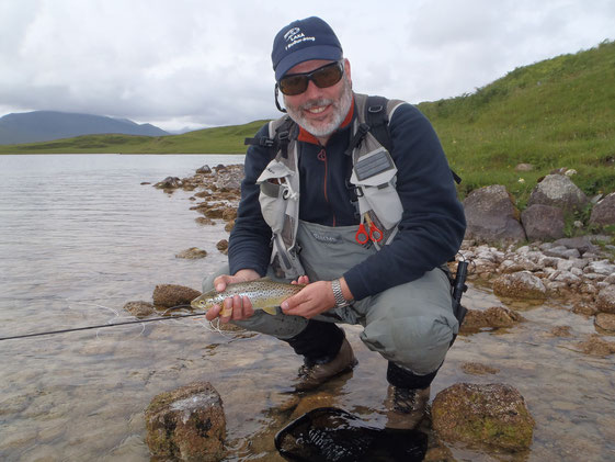 Dieter with his first fish from Borralie.