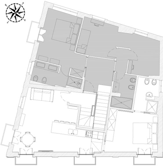 Grundriss der Panarea Suite im Palazzo Paladini Luxury Suites in Pizzo, Kalabrien, mit Schlafzimmer, Badezimmer, Wohnbereich und Küchenzeile