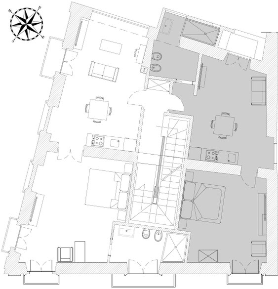 Grundriss der Palinuro Suite im Palazzo Paladini in Pizzo, Kalabrien, mit Schlafzimmer, Bad, Wohnbereich, Küchenzeile und Balkonen
