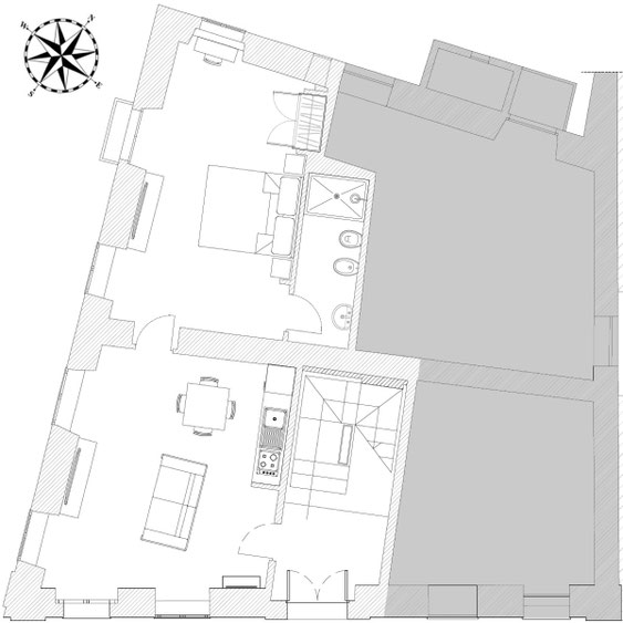 Grundriss der Marsili Suite im Palazzo Paladini Luxury Suites in Pizzo, Kalabrien, mit Schlafzimmer, Badezimmer, Wohnbereich und Küchenzeile