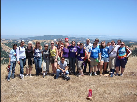 staff on top of a peak, overlooking our camp