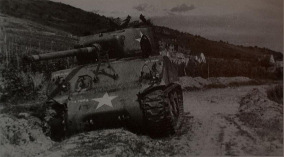 Knocked out US M4 Sherman (possibly by a Panzerfaust ) of B Company, 756th Tank Battalion between Kientzheim and Sigolsheim seen from Ammerschwihr Dec. 23,1944