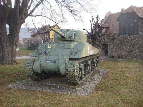 The western entrance to the village of Kientzheim with the M4 Sherman tank of the 5th French Armored Division. This M4 was knocked out on Dec. 18, 1944 after winning a shootout with a German Panther Tank.