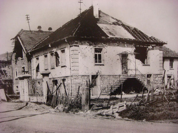 8 Route de Vin - site of the German CP, after the battle. On the right side of the photo was Walter Laich, armed with a Panzerfaust and knocked out Camille Girard's M4 Sherman Tank "Fort de France". (Photo courtesy Aimé Haubtmann)