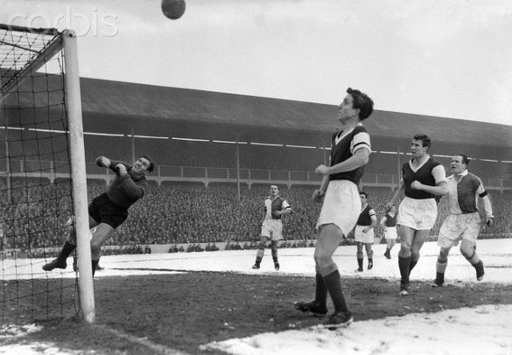 The West Ham goalkeeper punches clear against Rovers v West Ham United FA Cup 5th round replay on 23/02/1956 at a packed Ewood Park. Rovers lost 2-3.