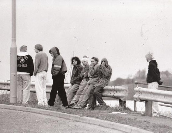 1990: Party goers waiting for a lift at the Whitebirk roundabout in Blackburn.