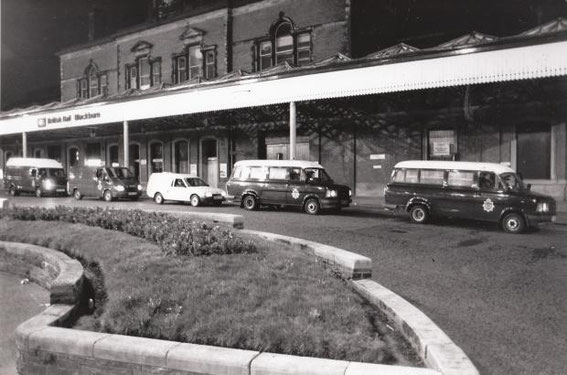 1990: Police wait for party-goers to arrive at Blackburn station.