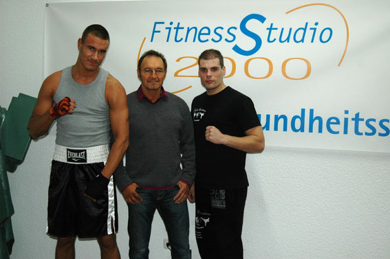 Box-Profi Kevin Kotzian, Studio-Besitzer Joachim Pasucha und Trainer Mike Kaul (v.l.).