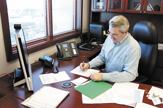 Dave North, President and CEO of Sedgwick Claims Management Services, works in his Bellevue office