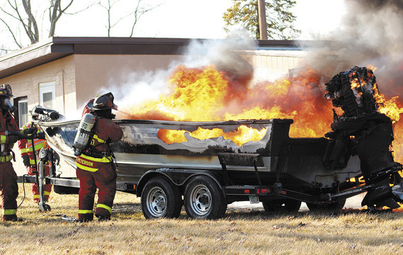 Bellevue Fire Fighters fight a boat fire at 32671 Smith's Ferry Road.