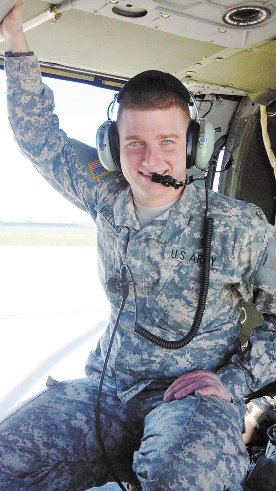Iowa National Guardsman Steve Moellers of Bellevue is pictured here inside a Black Hawk helicopter in Kosovo. (photo courtesy Moeller family)