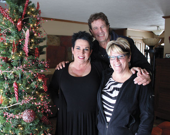 Sisters Pam (Spangler) Moriarty and Gemma (Spangler) Still are pictured here at their Spruce Creek home with their brother Peter Lana, who they met for the firsy time last Friday. Peter was put up for adoption in 1951 and never knew his natural family unt