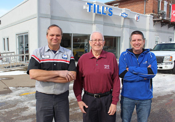 Tim Till, Ardell “Bud” Till and Steve Till, the third and fourth generations of the Till family, are marking 100 years in car and truck business in Bellevue. The dealership was created by Bud’s grandfather, J.J. Till.