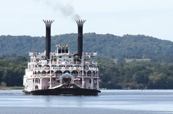 The massive steamboat known as the American Queen, with 370 passengers on board, rolled down the Mississippi River from Dubuque to Bellevue last Tuesday afternoon to lock through on its nine-day journey to the Port of St. Louis, Missouri.