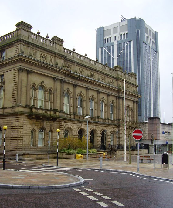 The Italianate 19th-century town hall and its 1960s counterpart—the reclad new town hall