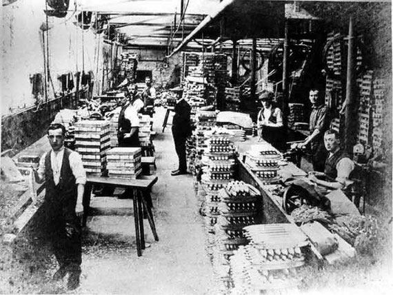 Workers producing shuttles for the textile industry, c. 1920. Rowland Baguley and Company, based on Addison Street, produced a wide range of shuttles for the home textile industry and for export before it closed in the early 1930s.