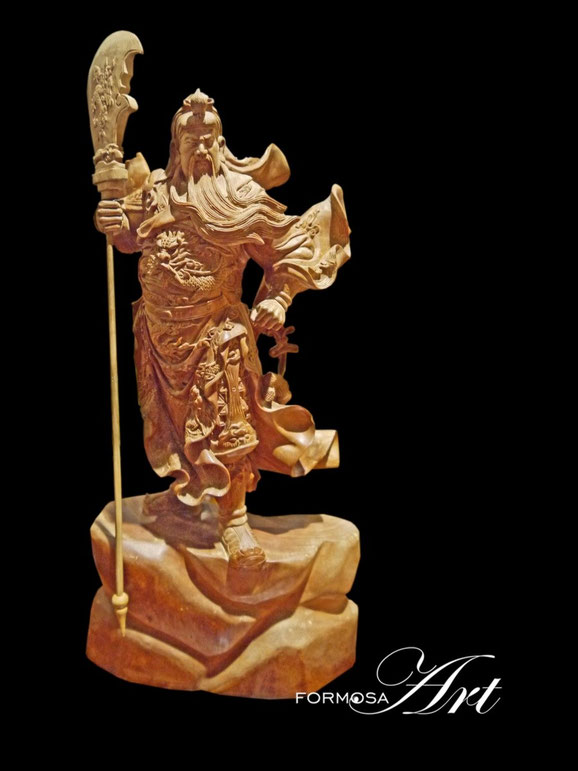 Guan Gong holding his Guan Dao