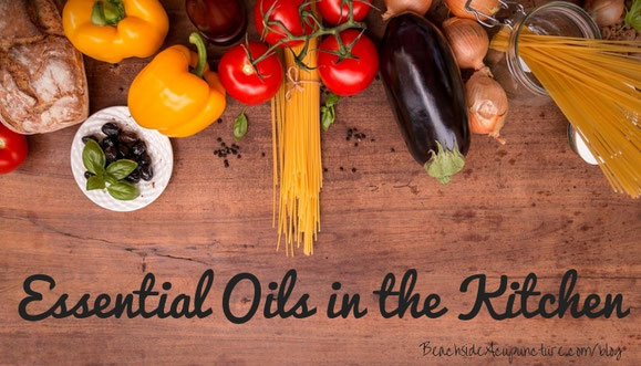 "Essential Oils in the Kitchen" over cutting board with fresh food