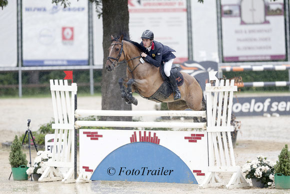 Fraser Reed on Harry, winning the 1.30m pony class. Photo FotoTrailer