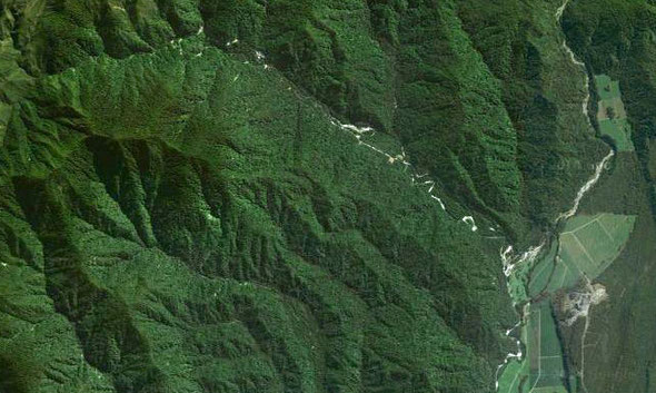 The location of the Pike River Mine. The Big River is on right of photo. At confluence with Pike River (from left) is the processing plant. The mine entrance is high up the Pike River at 800m.
