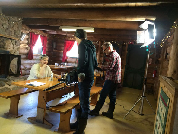 Lighting up the log cabin with The Best of Nova Scotia production team.