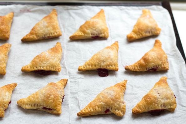 These mini cranberry-orange turnovers are a festive and flavorful dessert for holiday gatherings! 