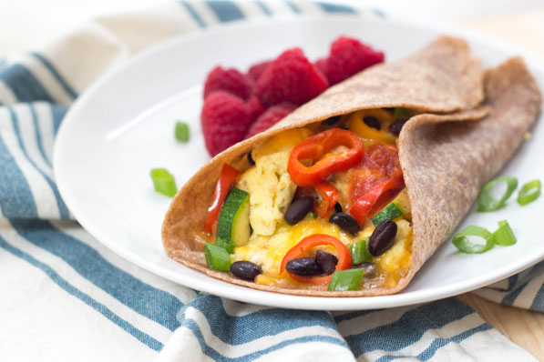 These easy egg burritos with sweet peppers, zucchini, and black beans are the perfect protein-packed, flavorful, and fun healthy breakfast-on-the go! #AD