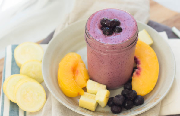 Yellow squash blends into this blueberry-peach smoothie beautifully! This smoothie is a healthy, creamy, gluten free, vegetarian breakfast option that's so refreshing in these hot summer months!