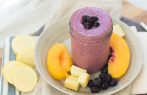 Yellow squash blends into this blueberry-peach smoothie beautifully! This smoothie is a healthy, creamy, gluten free, vegetarian breakfast option that's so refreshing in these hot summer months! 