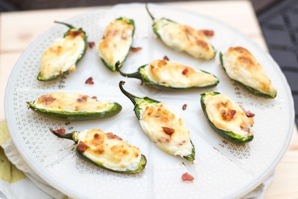 These lighter bacon cream cheese stuffed jalapeno poppers are the best appetizer recipe!  Everyone will love them and no one will notice they're a healthier snack option! 