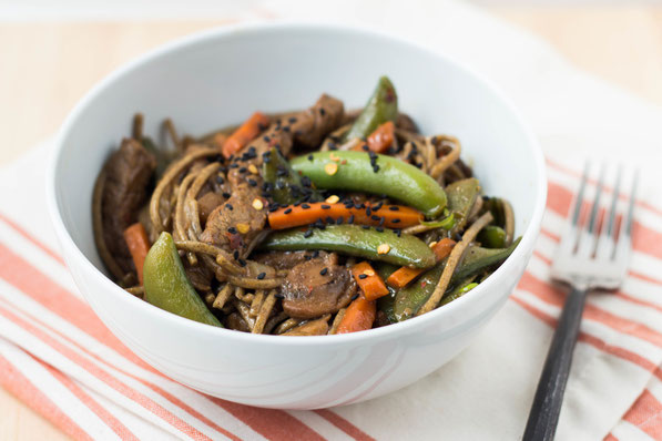 Frozen stir-fry vegetables and a delicious, easy-to-make marinade are the perfect addition to this quick beef, soba noodle, and veggie stir fry.  This recipe is healthy homemade fast food at it's finest!