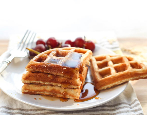 These tasty homemade waffles with the nutty goodness of whole grain oats are the perfect way to start the day! They're also a great freezer-friendly breakfast, so you can have a hearty, homemade waffle on-hand any day of the week!