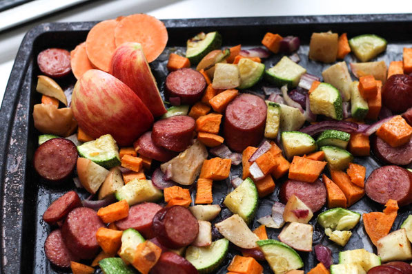 This easy sheet pan dinner made with turkey sausage,  sweet potatoes, apples, and zucchini is the perfect quick weeknight fall-inspired healthy dinner recipe! 