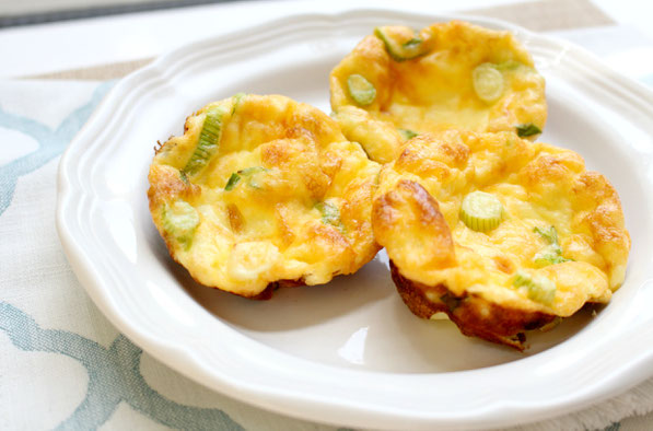 These easy gluten free mini frittatas have just four ingredients and take just a few minutes to make!  They're a quick, healthy option for breakfast or "breakfast for dinner!"