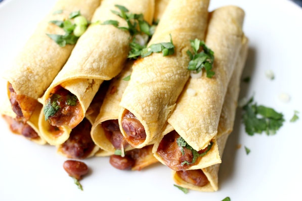 These baked vegetarian chili cheese taquitos are the perfect quick healthy weeknight dinner recipe! They're ready in about 20 minutes and are very family friendly!